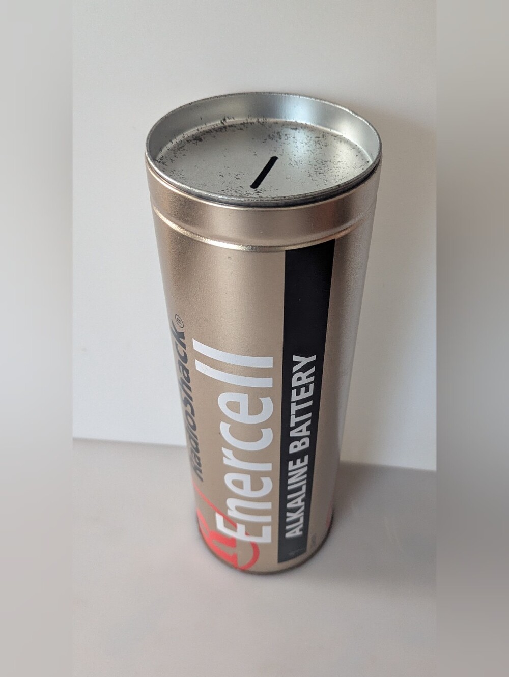 Vintage Tin Radio Shack Alkaline AA Enercell Battery Coin Bank. 12" x 4"